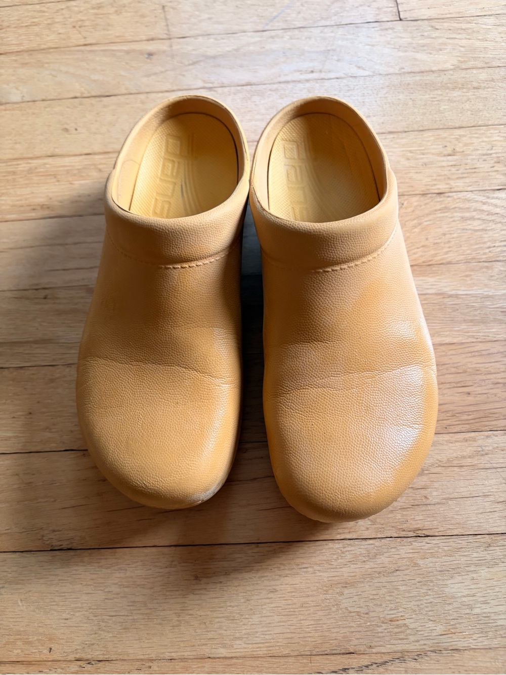 Dansko Women's Clogs in Mustard